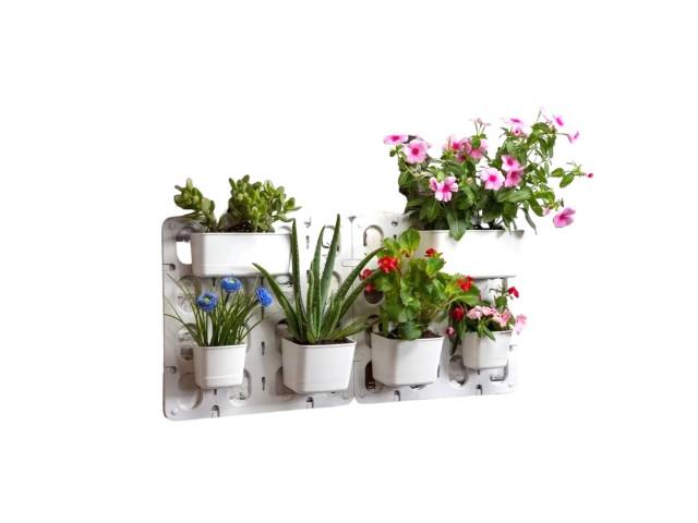 Cultiva un jardín  vertical en tu hogar con el Kit 6 Macetas Jardín Vertical Modular de Pared Vertibloom Interior. Incluye 6 macetas, sistema de montaje modular y diseño elegante. Ideal para hierbas, flores y plantas pequeñas. 